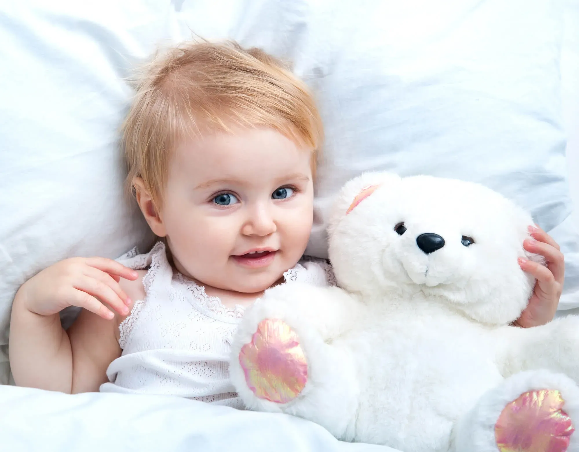 Cadou pentru copilul de un an de la nas sau nasa. Ce sa cumperi pentru baieti si fete?